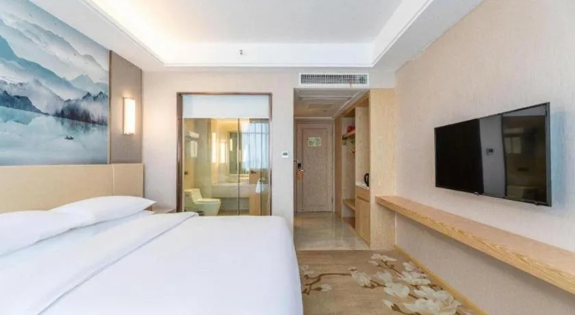 Bed in Vienna Hotel Hunan Huaihua Xupu Wanda Plaza