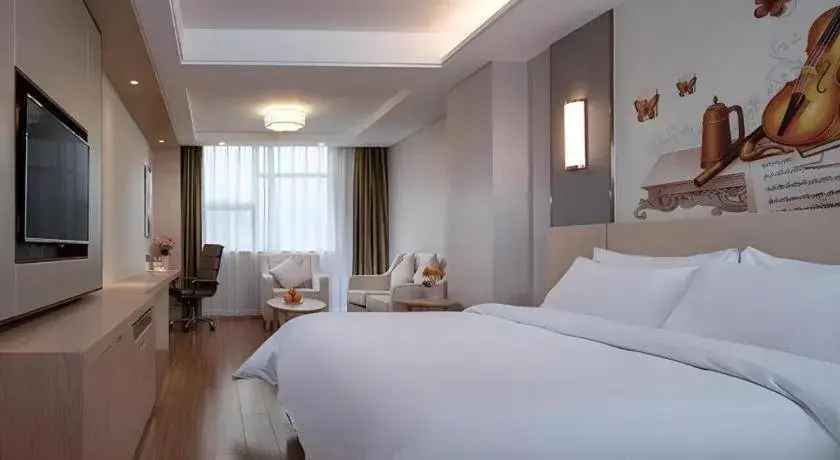 Bed in Vienna Hotel Hunan Huaihua Xupu Wanda Plaza Bed in Vienna Hotel Hunan Huaihua Xupu Wanda Plaza