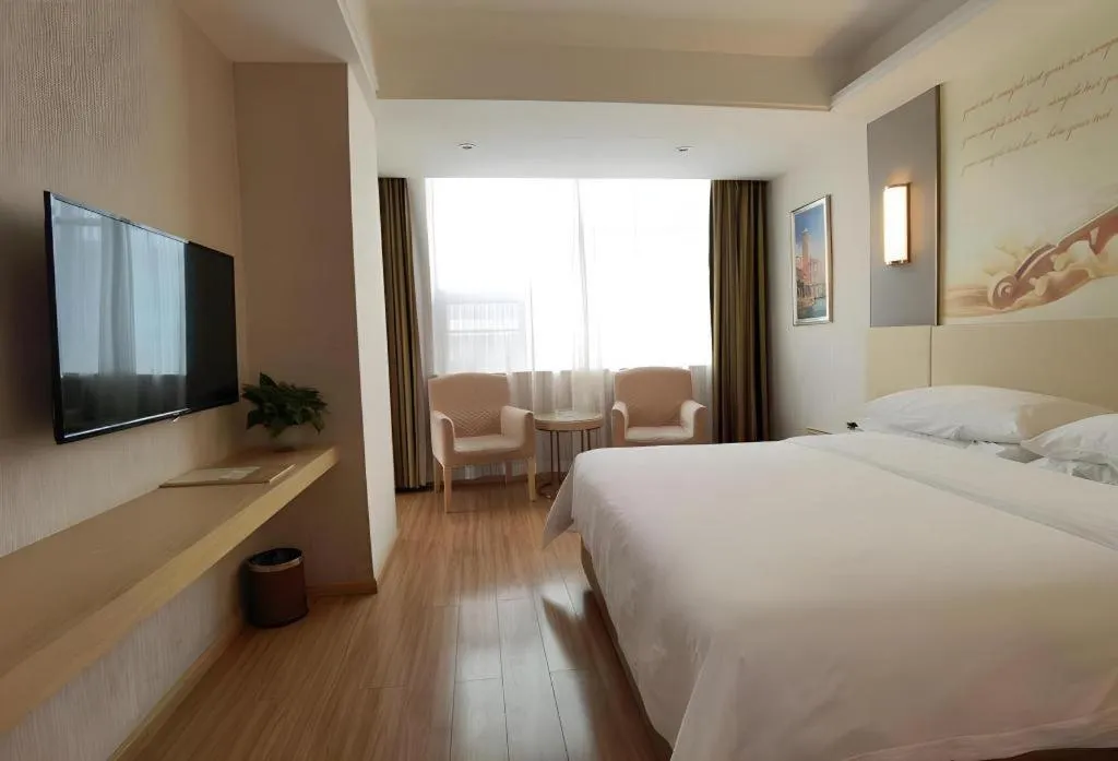 Bed in Vienna Hotel Hunan Huaihua Xupu Wanda Plaza