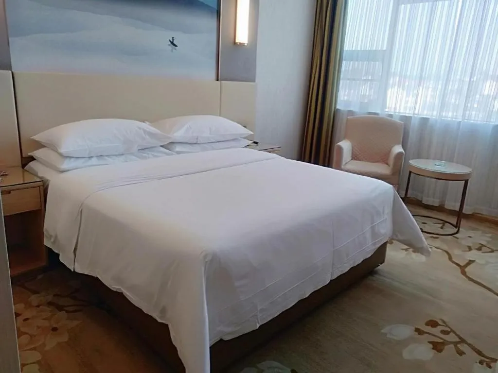 Bed in Vienna Hotel Hunan Huaihua Xupu Wanda Plaza
