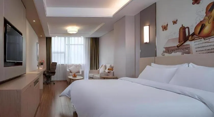 Bed in Vienna Hotel Hunan Huaihua Xupu Wanda Plaza