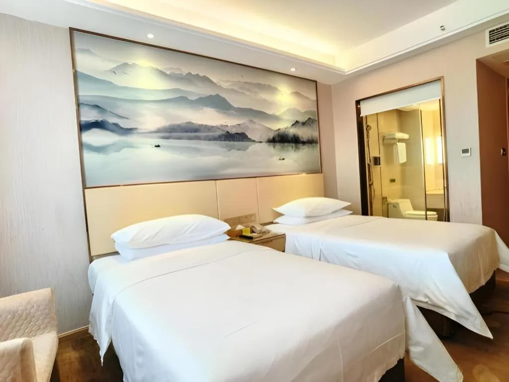 Bed in Vienna Hotel Hunan Huaihua Xupu Wanda Plaza