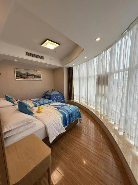 Bed in Vienna Hotel Hunan Huaihua Xupu Wanda Plaza