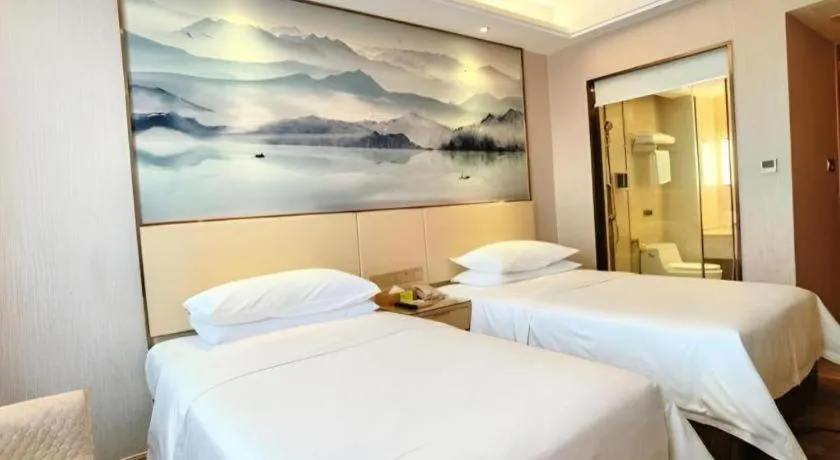 Bed in Vienna Hotel Hunan Huaihua Xupu Wanda Plaza