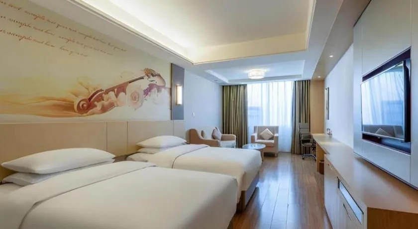 Bed in Vienna Hotel Hunan Huaihua Xupu Wanda Plaza