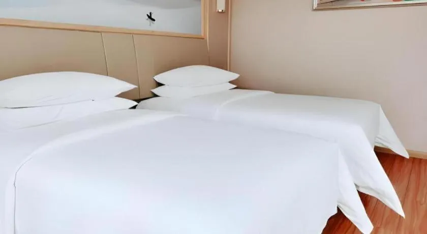 Bed in Vienna Hotel Hunan Huaihua Xupu Wanda Plaza
