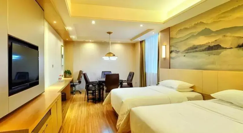 Bed in Vienna Hotel Hunan Huaihua Xupu Wanda Plaza Bed in Vienna Hotel Hunan Huaihua Xupu Wanda Plaza