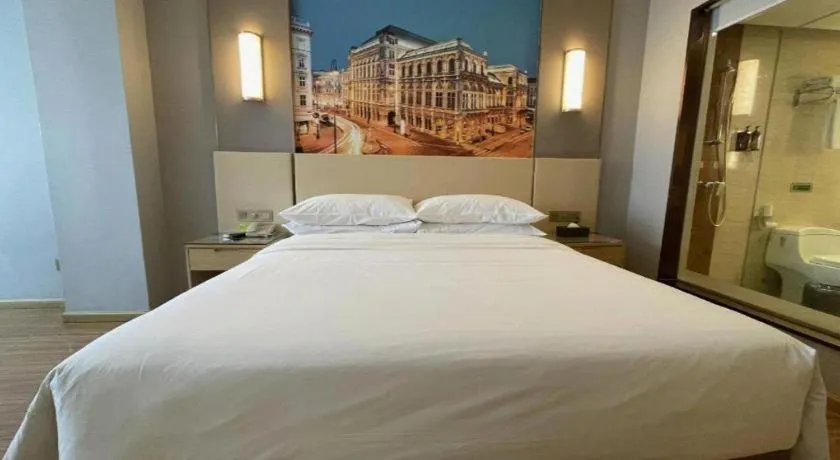 Bed in Vienna Hotel Hunan Huaihua Xupu Wanda Plaza