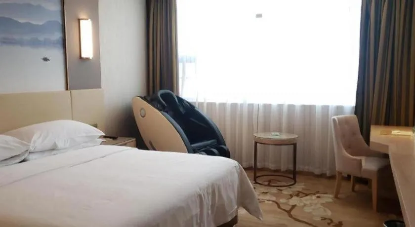 Bed in Vienna Hotel Hunan Huaihua Xupu Wanda Plaza