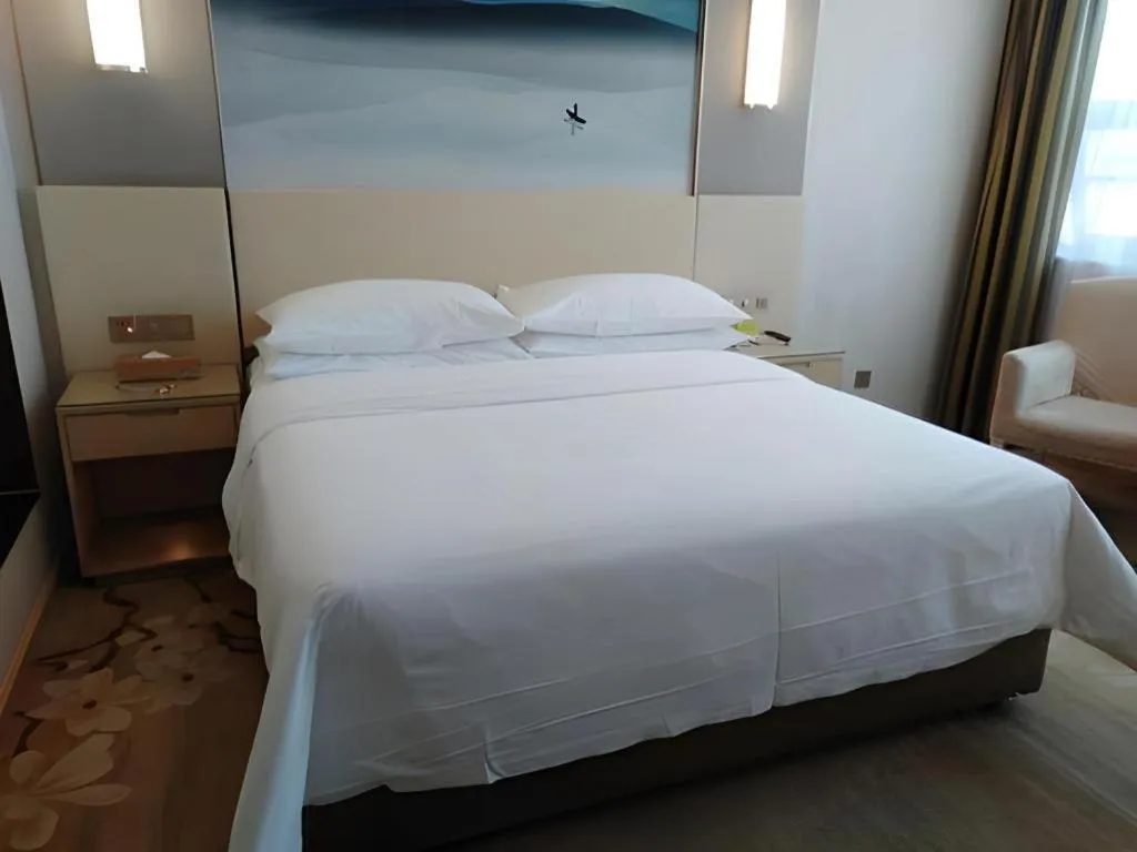 Bed in Vienna Hotel Hunan Huaihua Xupu Wanda Plaza