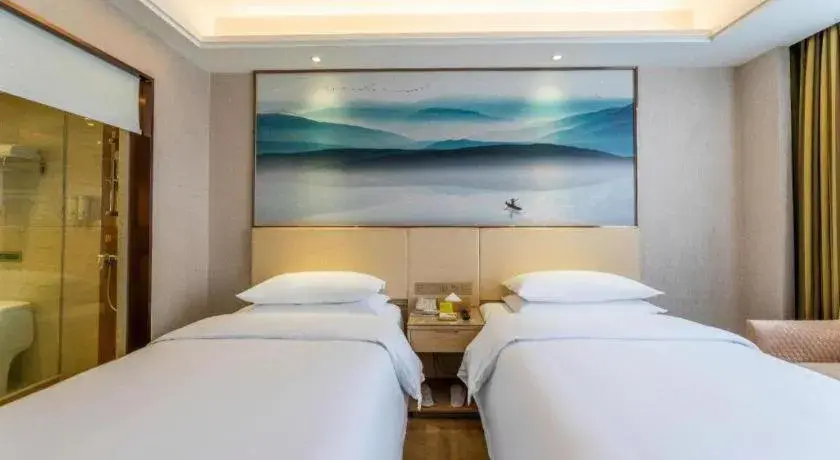 Bed in Vienna Hotel Hunan Huaihua Xupu Wanda Plaza Bed in Vienna Hotel Hunan Huaihua Xupu Wanda Plaza