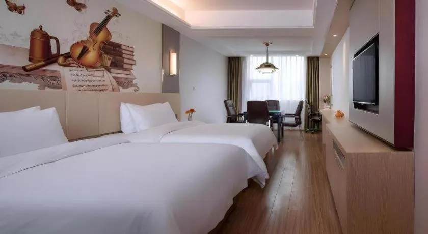 Bed in Vienna Hotel Hunan Huaihua Xupu Wanda Plaza