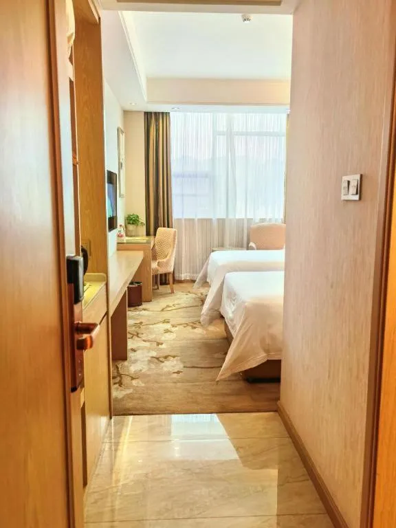 Bed in Vienna Hotel Hunan Huaihua Xupu Wanda Plaza