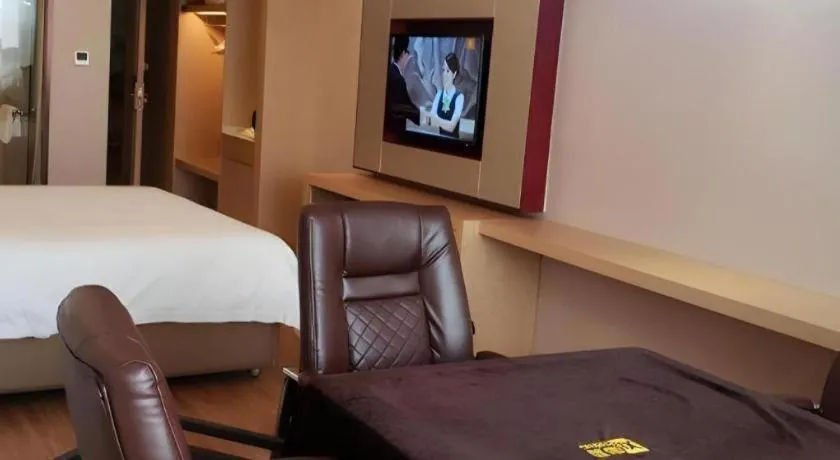 Bed in Vienna Hotel Hunan Huaihua Xupu Wanda Plaza