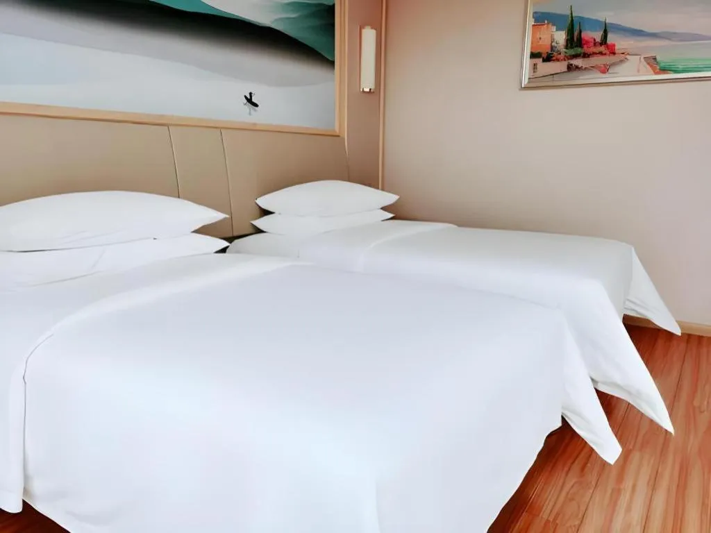 Bed in Vienna Hotel Hunan Huaihua Xupu Wanda Plaza