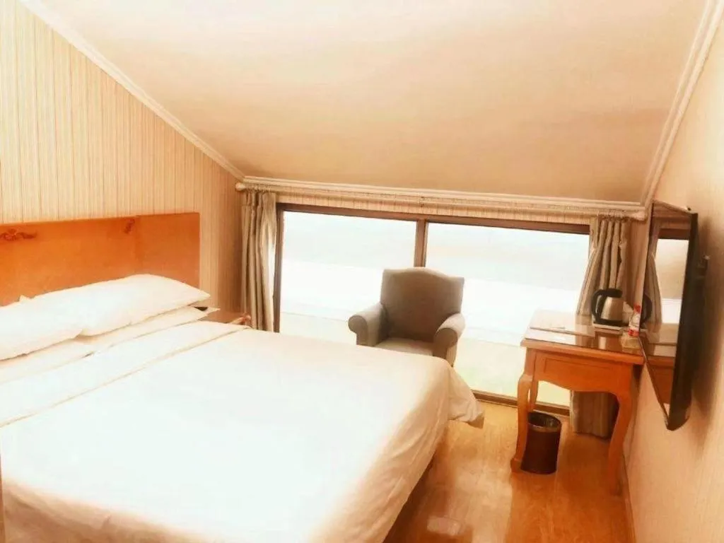 Bed in Vienna Hotel Inner Mongolia Tongliao Development Zone