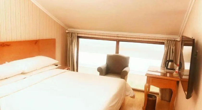 Bed in Vienna Hotel Inner Mongolia Tongliao Development Zone