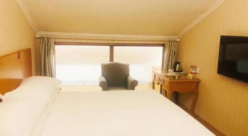 Bed in Vienna Hotel Inner Mongolia Tongliao Development Zone