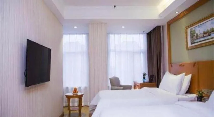 Bed in Vienna Hotel Inner Mongolia Tongliao Development Zone