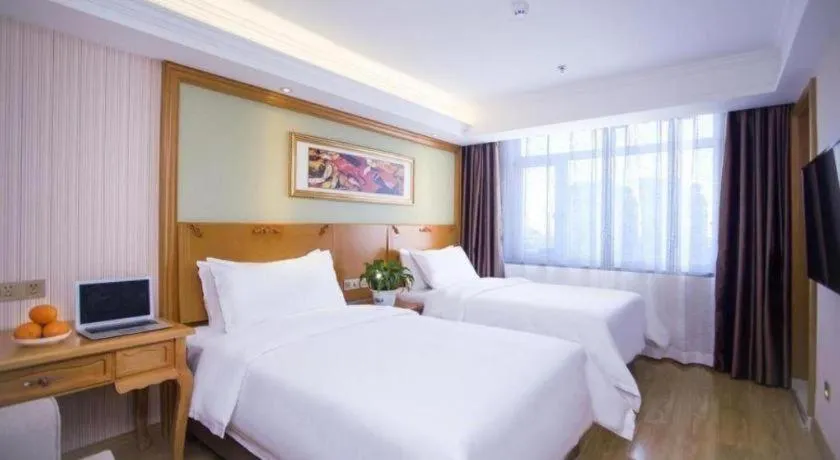 Bed in Vienna Hotel Inner Mongolia Tongliao Development Zone