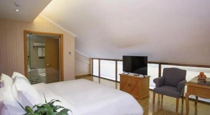 Bed in Vienna Hotel Inner Mongolia Tongliao Development Zone