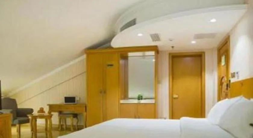 Bed in Vienna Hotel Inner Mongolia Tongliao Development Zone