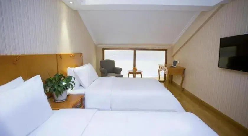 Bed in Vienna Hotel Inner Mongolia Tongliao Development Zone Bed in Vienna Hotel Inner Mongolia Tongliao Development Zone