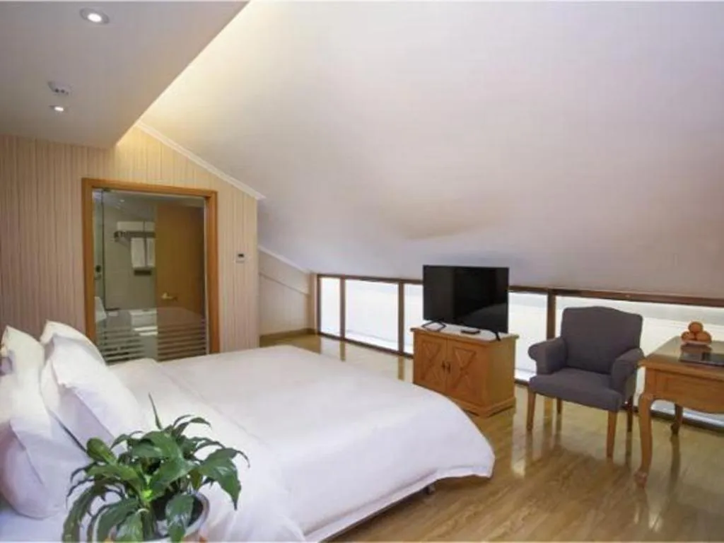 Bed in Vienna Hotel Inner Mongolia Tongliao Development Zone