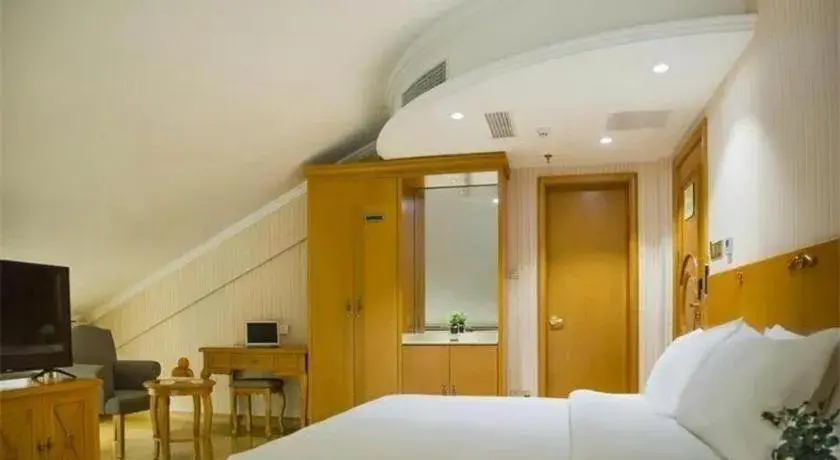 Bed in Vienna Hotel Inner Mongolia Tongliao Development Zone Bed in Vienna Hotel Inner Mongolia Tongliao Development Zone