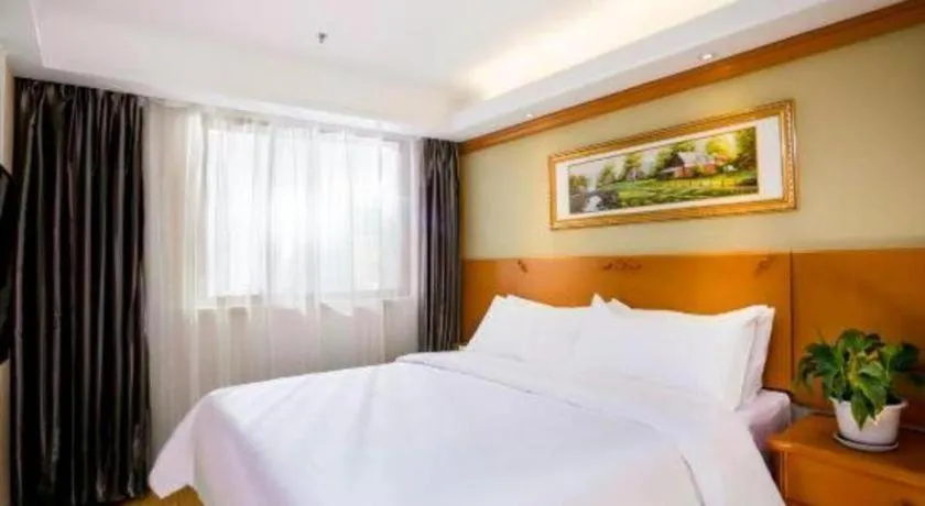 Bed in Vienna Hotel Inner Mongolia Tongliao Development Zone