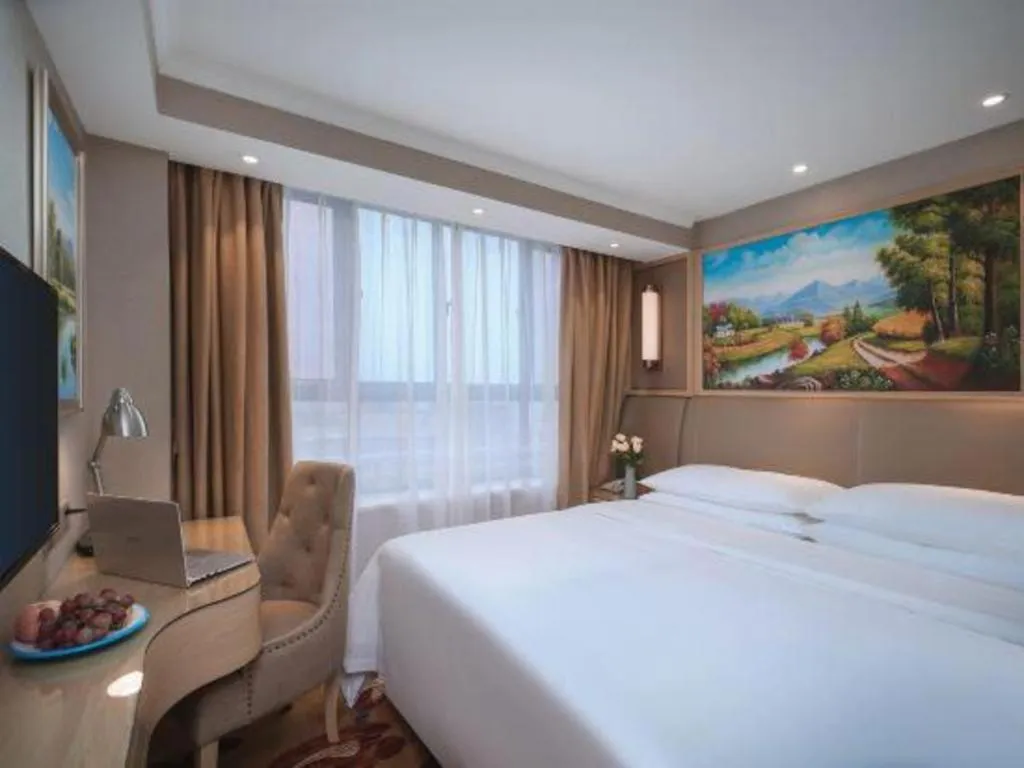 Bed in Vienna Hotel Shandong Liaocheng High-Tech Zong Yueji Park