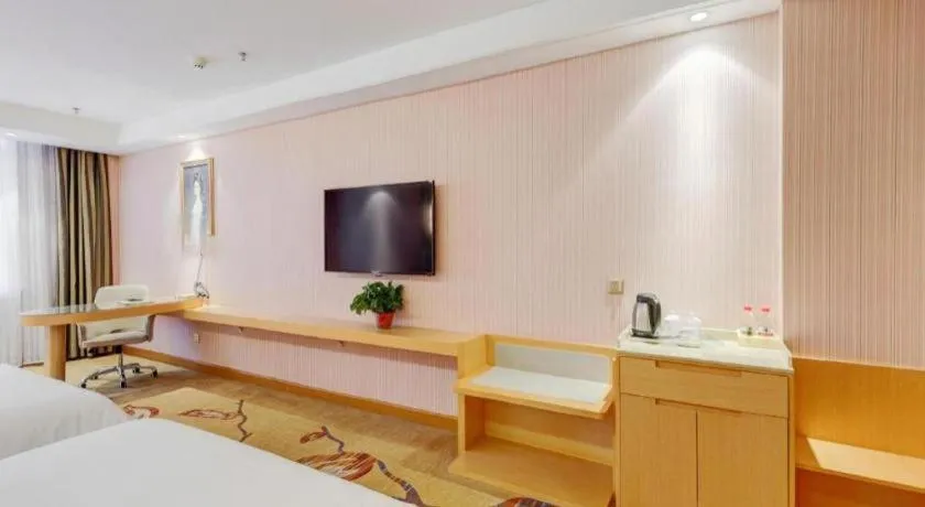 Bed in Vienna Hotel Shandong Qufu Sankong Landscape