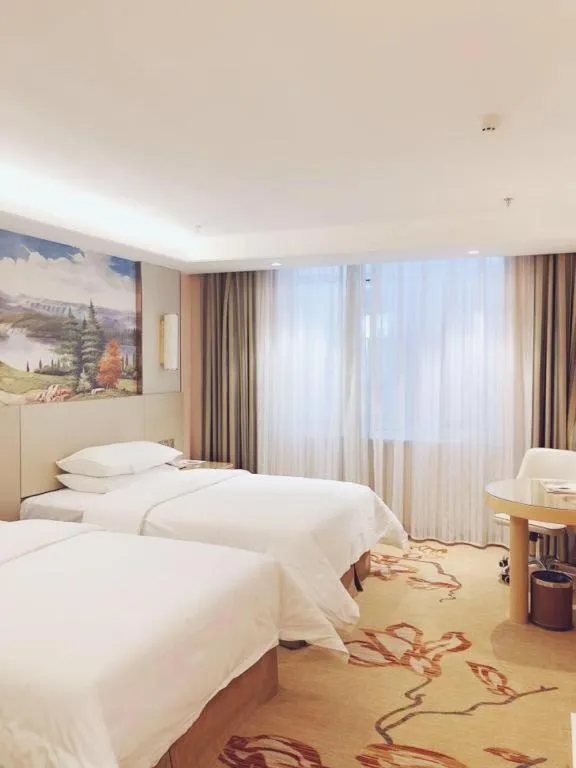 Bed in Vienna Hotel Shandong Qufu Sankong Landscape
