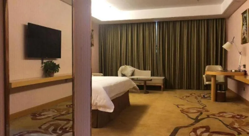Bed in Vienna Hotel Shandong Qufu Sankong Landscape