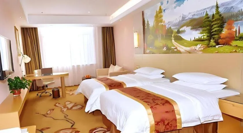 Bed in Vienna Hotel Shandong Qufu Sankong Landscape