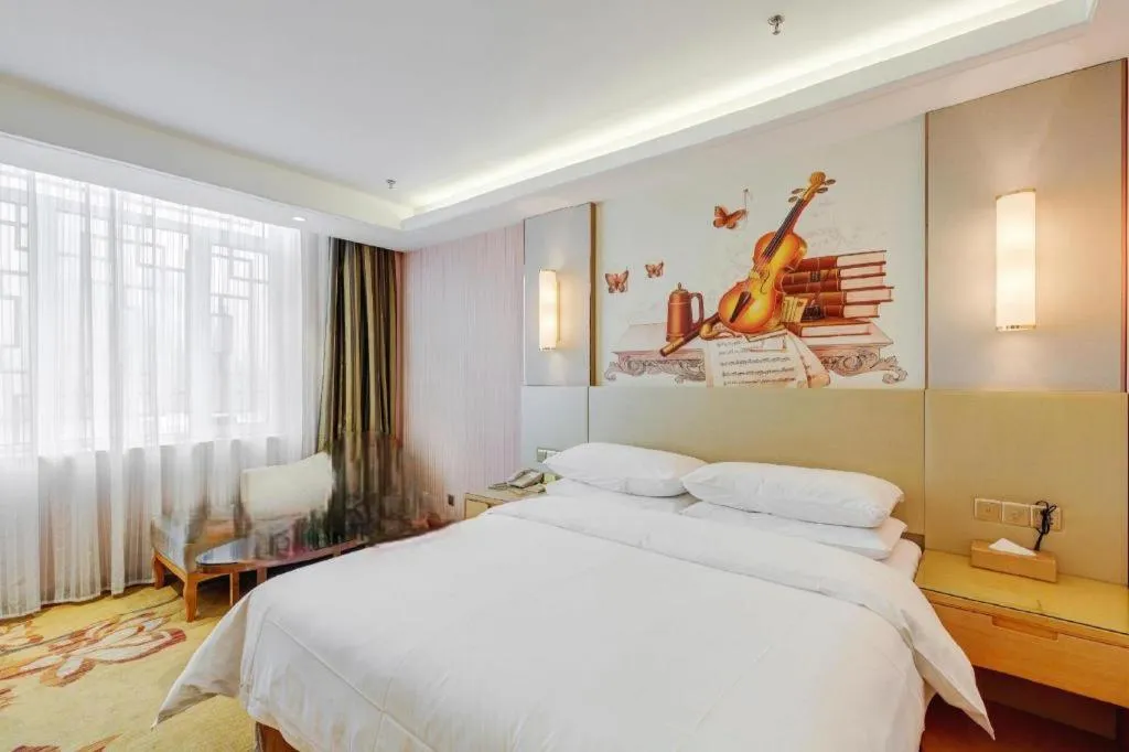 Bed in Vienna Hotel Shandong Qufu Sankong Landscape