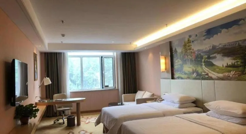 Bed in Vienna Hotel Shandong Qufu Sankong Landscape