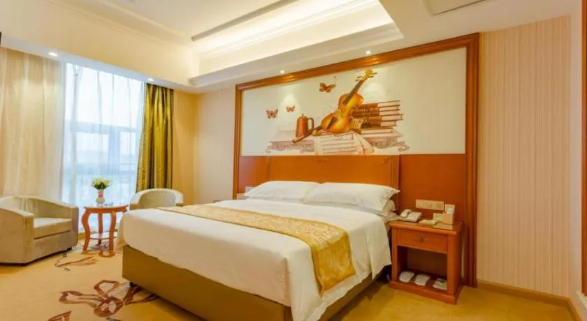 Bed in Vienna Hotel Shandong Qufu Sankong Landscape