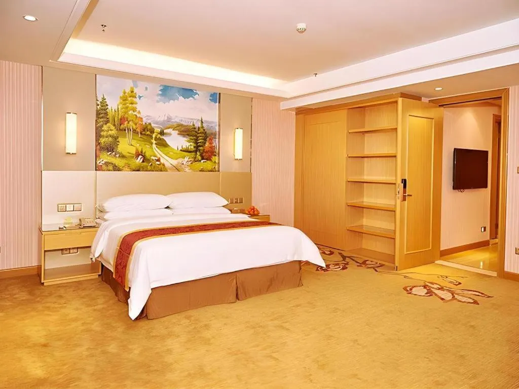 Bed in Vienna Hotel Shandong Qufu Sankong Landscape
