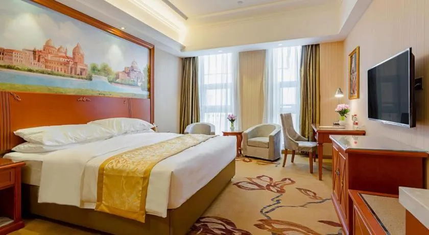 Bed in Vienna Hotel Shandong Qufu Sankong Landscape
