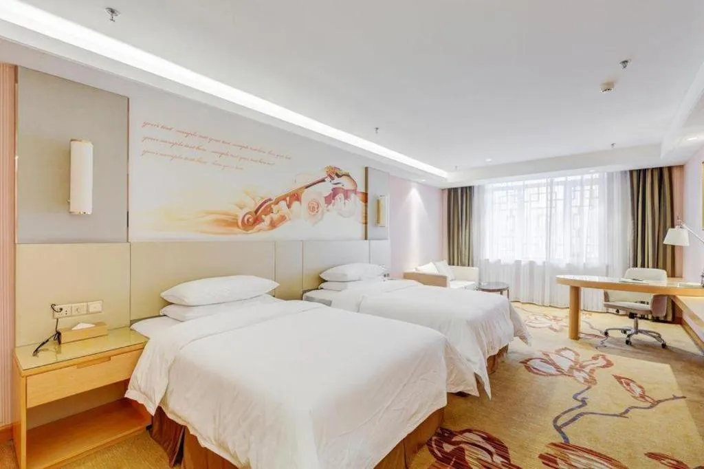 Bed in Vienna Hotel Shandong Qufu Sankong Landscape
