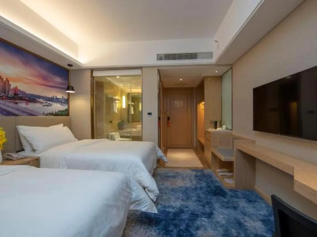 Bed in Vienna Hotel Shaanxi Hanzhong Central Square High-Speed Railway Station