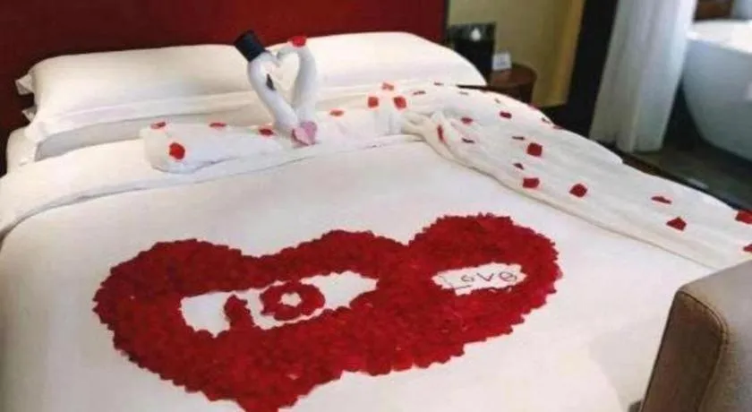 Bed in Vienna Hotel Shaanxi Hanzhong Central Square High-Speed Railway Station