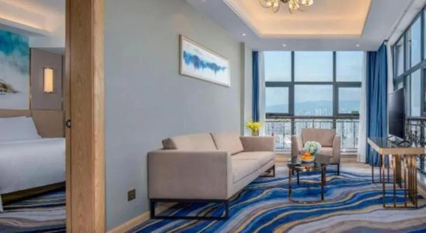 Bed in Vienna Hotel Shaanxi Hanzhong Central Square High-Speed Railway Station