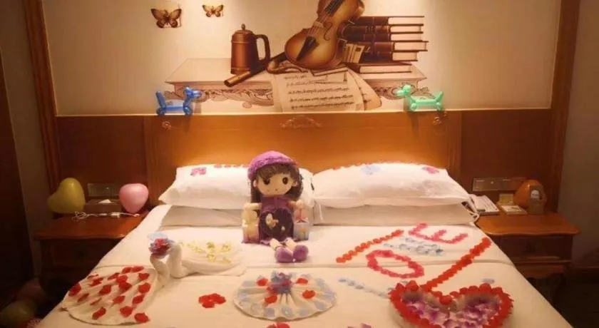 Bed in Vienna Hotel Shaanxi Hanzhong Central Square High-Speed Railway Station