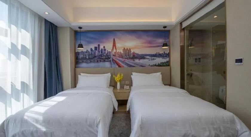 Bed in Vienna Hotel Shaanxi Hanzhong Central Square High-Speed Railway Station