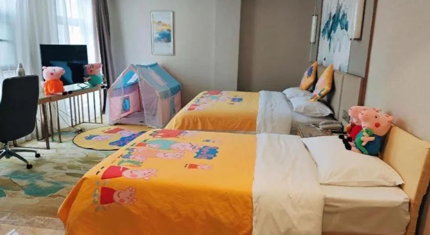 Bed in Vienna Hotel Shaanxi Hanzhong Central Square High-Speed Railway Station