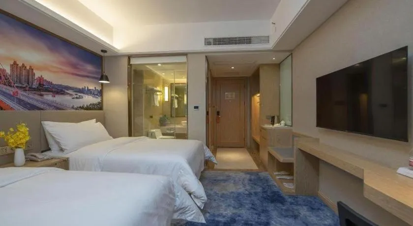 Bed in Vienna Hotel Shaanxi Hanzhong Central Square High-Speed Railway Station