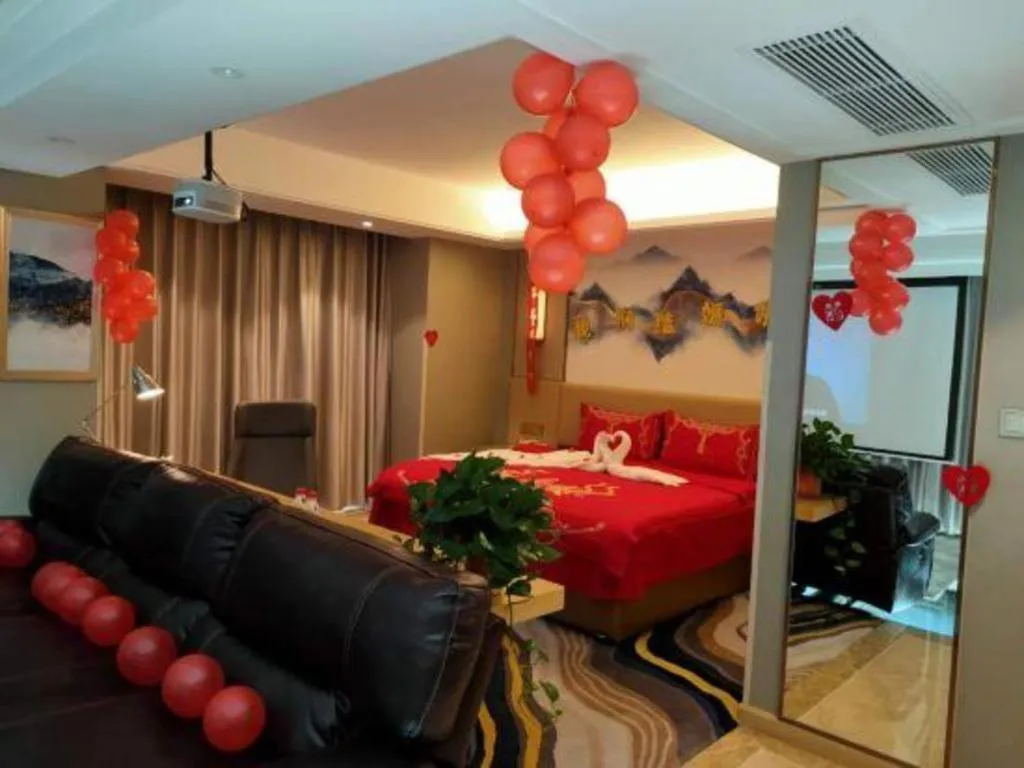 Bed in Vienna Hotel Shaanxi Hanzhong Central Square High-Speed Railway Station