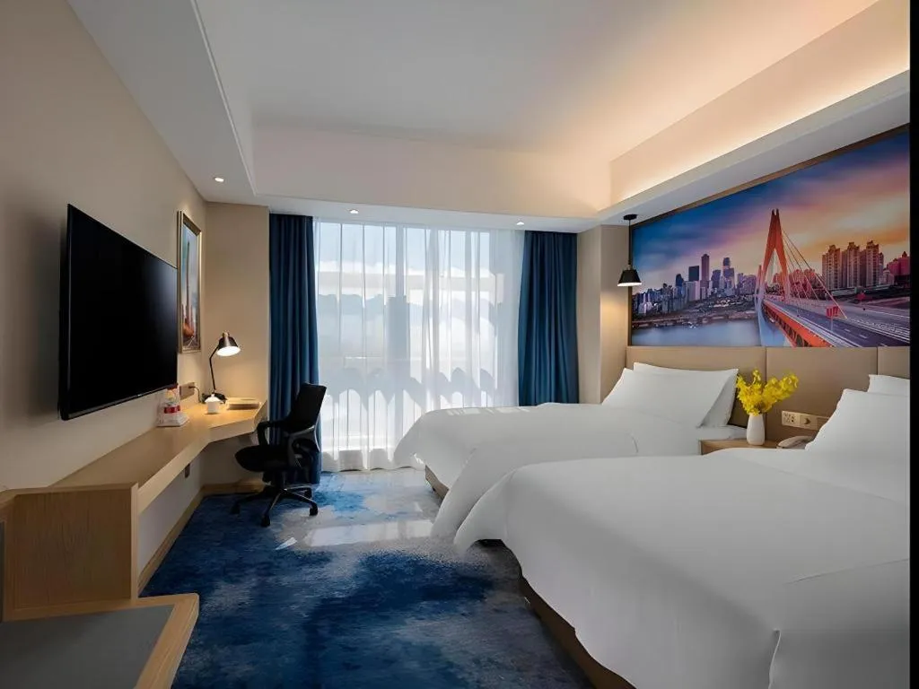 Bed in Vienna Hotel Shaanxi Hanzhong Central Square High-Speed Railway Station
